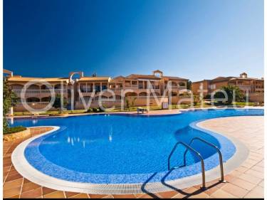 PLANTA BAJA CON TERRAZA Y SOLARIUM, GARAJE Y PISCINA