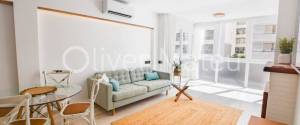 APARTAMENTO DOS DORMITORIOS CON TERRAZA EN PASEO MARÍTIMO CON VISTAS LATERALES AL MAR