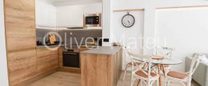 APARTAMENTO DOS DORMITORIOS CON TERRAZA EN PASEO MARÍTIMO CON VISTAS LATERALES AL MAR