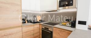 APARTAMENTO DOS DORMITORIOS CON TERRAZA EN PASEO MARÍTIMO CON VISTAS LATERALES AL MAR