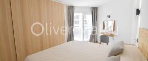 APARTAMENTO DOS DORMITORIOS CON TERRAZA EN PASEO MARÍTIMO CON VISTAS LATERALES AL MAR