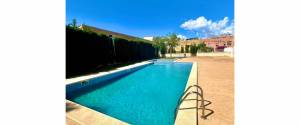 PLANTA BAJA CON JARDIN, APARCAMIENTO Y PISCINA COMUNITARIA