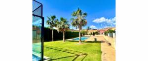 PLANTA BAJA CON JARDIN, APARCAMIENTO Y PISCINA COMUNITARIA