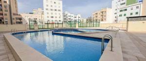 ÁTICO EN EL CENTRO CON TERRAZA Y PISCINA