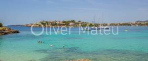 PLANTA BAJA JUNTO A LA PLAYA CON PISCINA COMUNITARIA Y JARDÍN PROPIO EN PORTO COLOM