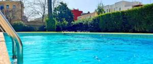 SEMINUEVO PISO EN URBANIZACIÓN PRIVADA CON PISCINA Y PLAZA DE PARKING