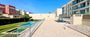 SEMINUEVO PISO EN URBANIZACIÓN PRIVADA CON PISCINA Y PLAZA DE PARKING