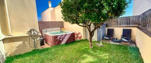 ERDGESCHOSS-WOHNUNG MIT TERRASSE, GARTEN UND PARKPLATZ
