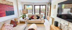 ERDGESCHOSS-WOHNUNG MIT TERRASSE, GARTEN UND PARKPLATZ
