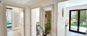 ERDGESCHOSS-WOHNUNG MIT TERRASSE, GARTEN UND PARKPLATZ