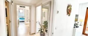 ERDGESCHOSS-WOHNUNG MIT TERRASSE, GARTEN UND PARKPLATZ