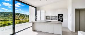 CHALET ADOSADO  CON ASCENSOR, TERRAZA ,  JARDÍN, GARAJE Y VISTAS DESPAJADAS AL CAMPO