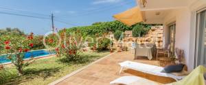 PLANTA BAJA JUNTO A LA PLAYA CON PISCINA COMUNITARIA Y JARDÍN PROPIO EN PORTO COLOM