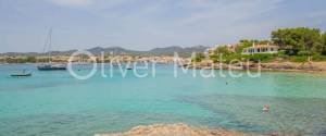 PLANTA BAJA JUNTO A LA PLAYA CON PISCINA COMUNITARIA Y JARDÍN PROPIO EN PORTO COLOM