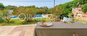 PLANTA BAJA JUNTO A LA PLAYA CON PISCINA COMUNITARIA Y JARDÍN PROPIO EN PORTO COLOM