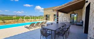 SINGLE-FAMILY HOUSE WITH POOL, GARDEN AND GARAGE