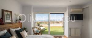 LARGE SEMI-DETACHED VILLA IN PORTOL WITH GARDEN, GARAGE, AND POOL